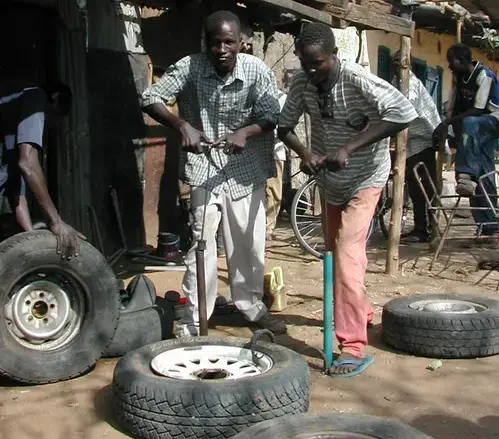 Youth at work at a local garage